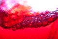 Red soda water splashing with bubbles close up and Dew Point on Royalty Free Stock Photo