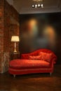 Red sofa and lamp Royalty Free Stock Photo