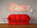 Red sofa with table and stand lamp Royalty Free Stock Photo