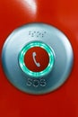 Red SOS emergency telephone button Royalty Free Stock Photo