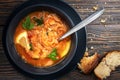 Red soup with vegetables and meat, tasty, appetizing traditional Ukrainian borsch, close-up, top view, shallow depth of