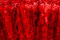 Red Sparkling Lights Festive background with texture. Abstract Christmas twinkled bright bokeh. Red glitter texture Royalty Free Stock Photo