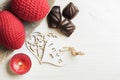 Red sparkling lit candle and dark chocolate Royalty Free Stock Photo