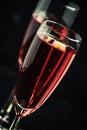 Red sparkling wine, black background, selective focus Royalty Free Stock Photo