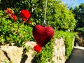 Red sparkly heart decoration on a string