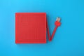 Red speaker on blue background Royalty Free Stock Photo