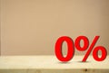 Red 0 % for special Offer or zero percent on wooden background with copy space Royalty Free Stock Photo