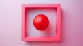 Red sphere in a pink square frame on a pastel background