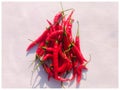 Red spicy chillies with white background jpg Royalty Free Stock Photo