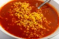 Red Spicy Noodle Soup in White Bowl, Hot Chili Pepper Ramen Closeup Royalty Free Stock Photo