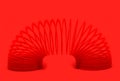 Red sping toy Isolated On red Background Royalty Free Stock Photo