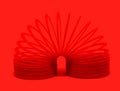 Red sping toy Isolated On red Background Royalty Free Stock Photo