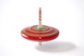 A red spinning top