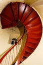 Red spiral staircase inside the old lighthouse Royalty Free Stock Photo