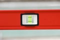 Red spirit level for architectural and construction works Royalty Free Stock Photo