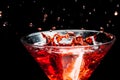 Red splashing cocktail Royalty Free Stock Photo