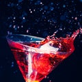 Red splashing cocktail Royalty Free Stock Photo