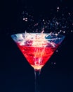 Red splashing cocktail Royalty Free Stock Photo