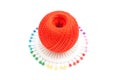 Red spool of thread and pins Royalty Free Stock Photo