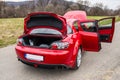 Red sport car Mazda RX-8 in nature.