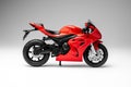 Red sportbike motorcycle model on white