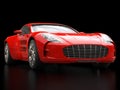 Red sports car - closeup shot - isolated on black background Royalty Free Stock Photo