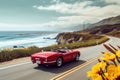 A red sports car drives swiftly down a road alongside the beautiful ocean, A convertible sports car driving along a coastal road,