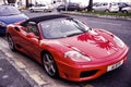 Red sports car ferrari convertible parking on road in France Royalty Free Stock Photo