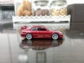 red sports car miniature, sedan car diecast, metal toy car Royalty Free Stock Photo