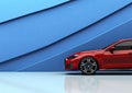 A red sports car parked in front of a blue wall Royalty Free Stock Photo