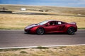 Red sports car on race track