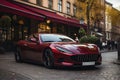 Red sports super concept car on the street of a European city, street racing on expensive exclusive luxury auto, AI Generated Royalty Free Stock Photo