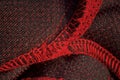 Red sportswear closeup top view. seam and juncture inside out. breathable knitwear. clothing details macro