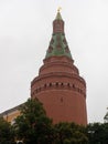 Red Square. The red brick tower of the Moscow Kremlin against a cloudy sky. Close-up, copy space. Moscow, Russia Royalty Free Stock Photo
