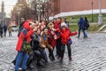 Red Square. A group of cheerful tourists and travelers are photographed with a delicious ice cream in memory of Russia.