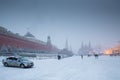 Red Square, Kremlin, Lenin mausoleum and police car in winter