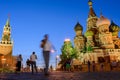 Walking tourists at night on Red Square. Royalty Free Stock Photo