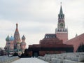 Red square in Moscow. Visible wall and towers of the Kremlin, Lenin Mausoleum and St. Basil's Cathedral Royalty Free Stock Photo