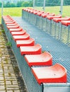 Red stadium seats, side view Royalty Free Stock Photo