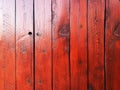 Red Stained  House Wall Fence Wood Boards Siding Fresh Paint Maroon Stain Shiny Cabin