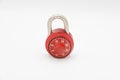 Red stainless steel lock on a white background