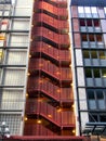 Red staircase between two buildings in Gastown, Vancouver, BC, Canada. Royalty Free Stock Photo