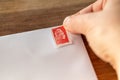 The red stamp of the Post Office, to send a priority letter, has been abolished since January 1, 2023 Royalty Free Stock Photo