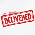 Red stamp with the word delivered in bold letters isolated on white background Royalty Free Stock Photo