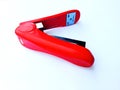 Red staples.  on white background Royalty Free Stock Photo