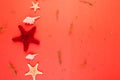 Red starfish background. Summer vacation concept. Flat lay. Royalty Free Stock Photo