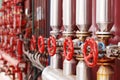 Red steam valves and pipes Royalty Free Stock Photo