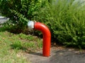 Red steel pipe fire hydrant with aluminum cap Royalty Free Stock Photo