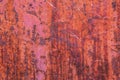 Red Steel wall rustic background with peeling paint.