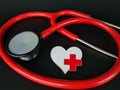 Red stethoscope for doctor diagnosing disease